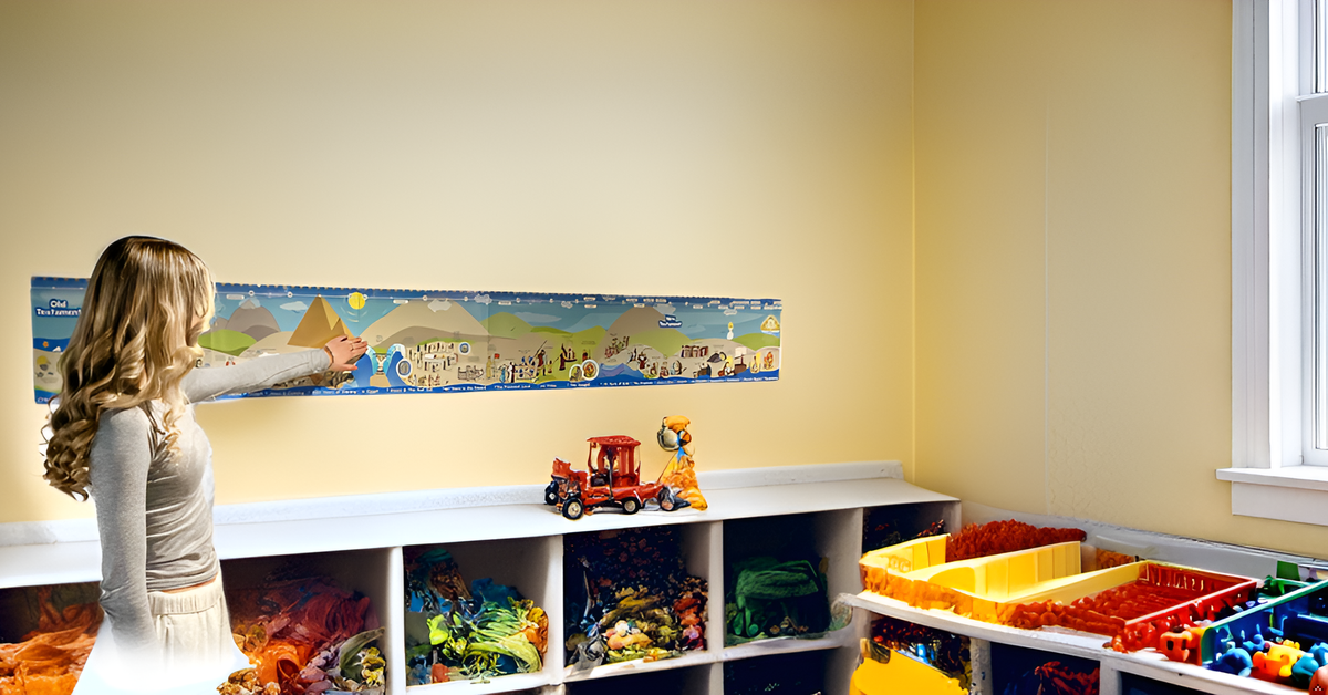 Girl pointing to a Bible Timeline Poster on the wall