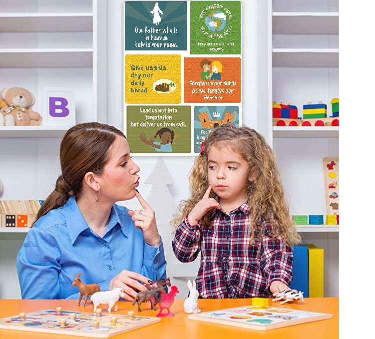 The Lord's Prayer Poster on the wall with child and teacher